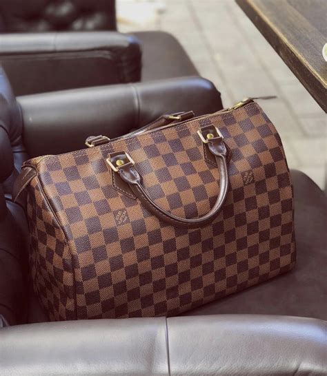 fake lv speedy bag|lv speedy bag with strap.